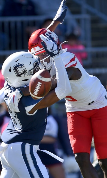 Coach's son leads Houston to 24-17 win over UConn
